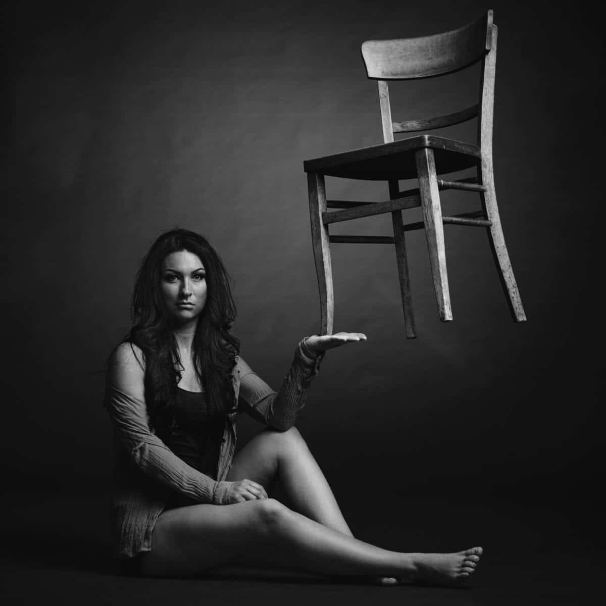 portrait of beauty with floating chair portrait of beauty with floating chair